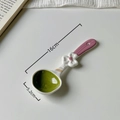 Cute ceramic spoon in grass green and white featuring a purple handle with heart flower - Fuyao-Long Handle Spoon