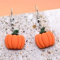 Boucles d'oreilles citrouille en résine orange avec tige verte et crochets argentés - Citrouille