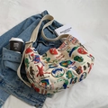 Vintage canvas schoudertas met retro-prints op blauwe denim en witte stof - Broken Wit