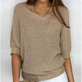 Detailed texture of champagne gold knit sweater with metallic shimmer and ribbed hem line - S / Tops / Khaki