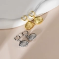 Minimalist shell-shaped earrings in gold and silver finish with polished metal textures - Steel Color - Shell Shape