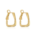 Detail of twisted gold geometric C-shaped hoop earrings with professional polished finish - Geometric Twisted Shape