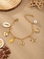 Golden ocean charm bracelet with starfish, pearl and H letter pendant on sand background - Letter H(H)