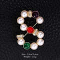 S-shaped golden brooch with white pearls, colored gems, and crystals on black leather - Pearl Letter S Style (XD11182)