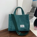 Bolso tote de pana verde con correa ajustable para el hombro y bolsillo frontal - Verde