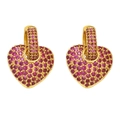 Macro detail of gold hoop earrings with pavé set pink heart-shaped zircon stones - Rose Red