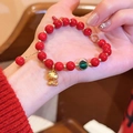 Detailed shot of a red agate beaded bracelet with a golden snake charm on a wrist. - Rhinestone Snake Style (4#) / Red-Gold
