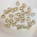 Golden plated round glass pendants for DIY jewelry making displayed in a white bowl - Gold Base Transparent White