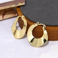 Hammered texture gold-plated hoop earrings on a vintage wooden jewelry display stand - Irregular Hammered Round Style (ZYN-DME315G-2)