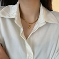 Double-layered gold heart pendant necklace featuring a wide flat snake bone chain - Double Layer Heart Necklace / Gold