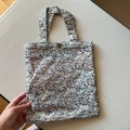 Close-up of small floral cotton handbag with vintage metal button and beige fabric - Grey Purple Beige Fine Floral(T-35)