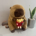 Cute brown plush capybara backpack holding small red fries toy with adjustable straps - Capybara Fries Style / 35cm
