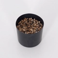 Artificial plant decor featuring a black cylindrical pot filled with natural mixed gravel - Plant Pot
