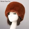 Close-up of thick brown faux fox fur hat showing plush texture and warmth on model - Dark Brown Faux Rex Rabbit Fox