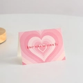 Carte de vœux rose avec cœurs superposés et lettrage artistique love you so much - Je t'aime tellement