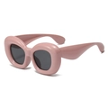 Oversized pink chunky square sunglasses with dark grey lenses in a 45-degree view - Solid Pink Frame Grey Lens