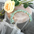 Handmade gold wire headband with irregular light blue raw crystals on pink stone - Light Green Crystal