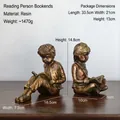 Pair of resin bookends showing boy and girl reading in an antique bronze finish - Vintage Reading Child Bookends 8054