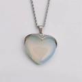 Detailed close-up of a silver heart-shaped opal pendant on a classic twisted chain - 60cm Twist Chain / White / Synthetic Opal