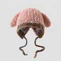 Detalle de gorro de invierno rosa de felpa con orejas de perro y lazos trenzados - 3-8 Años / Rosa