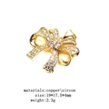Detail view of gold bow pendant with zircon, size 19x17.5x4mm and weight 2.3g - Bow (5)