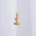 Macro detail of gold crown pendant with sparkling cubic zirconia for DIY jewelry - Gold Long Tassel Cap