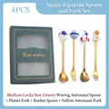 Space-themed 4-piece golden stainless steel spoon and fork set in a green gift box - Space Green 4PCS (Waving Astronaut Spoon/Planet Fork/Rocket Spoon/Yellow Astronaut Fork)