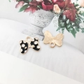 Black enamel bow pendant with white polka dots and gold finish for DIY jewelry - Polka Dot Bow
