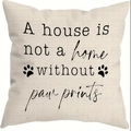 Beige linen pillowcase with black paw prints and text on a white background - Style E (A house is not a home)