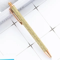 Glossy gold glitter ballpoint pen with rose gold clip on minimalist tile background - Gold (Rose Gold Parts)