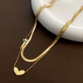 Detail of gold double-layered snake chain with love heart pendant and polished finish - 02-B1 Titanium Steel Heart Necklace Gold
