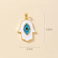 Gold Hamsa Hand pendant with white enamel and Evil Eye detail measuring 3.2cm by 2.1cm - Gold Hamsa Hand White Enamel Pendant (25-3)