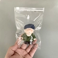 Portable clear PVC storage pouch with cartoon figure inside for cable organizing - 11x16cm