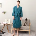 Men's dark green waffle robe with V-neck design and waist tie in home setting - Dark Green (Men)