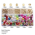 Flat lay of 770pcs DIY jewelry kit with pearls and gold beads in a 15-grid organizer box - Multicolor