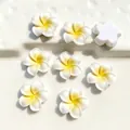 Set of 8 resin frangipani flower charms for DIY crafts with bright yellow centers - Small White