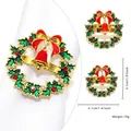 Golden Christmas wreath napkin ring with green enamel leaves and red bell detail - Christmas Wreath Style 50