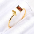Detailed view of adjustable gold-plated ring with yellow marquise and orange step-cut gems - US 7 / Yellow and Orange