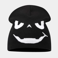 Close-up of black knitted beanie featuring white jacquard ghost face pattern for Halloween - Style B Black+White (Skull Jacquard)