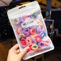 Kleurrijke elastische haarstrikjes set in een schattig decoratief opbergzakje - 50 stuks zak / Snoepkleur