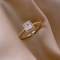 Adjustable golden ring with square zircon and pavé setting on soft silk fabric - Gold Square Zirconia
