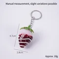 Pink strawberry keychain pendant with white drizzle pattern and metal ring - Dark Red Jam - White Strawberry (Keychain)
