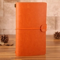 Orange leather traveler's notebook with vintage metal buckle and elastic band closure - Orange Traveler's Notebook