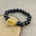 Men's faux obsidian bracelet featuring a golden PiXiu charm and engraved Mantra beads - 10mm Six-Syllable Mantra Pixiu