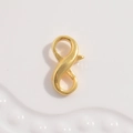 Macro shot of S925 sterling silver S-shaped lobster clasp in gold finish for DIY jewelry - Model C Gold 8-Shape Clasp