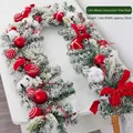 1.8m Christmas garland with red ornaments, ribbons and snowy flocking on white desk - 1.8m Snowy Mixed Garland Red