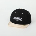 Detail of high-density FLORIDA 1845 embroidery on kids baseball cap with soft visor - 50cm (1-3 Years) / Black Color Block