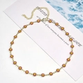 Golden clavicle necklace featuring red and yellow enamel daisy flower charms for women - Little Flower Necklace / Red