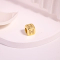 Gold plated square bead charm with micro-paved zircon stones featuring letter H - Letter H
