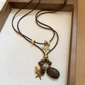 Collier bohème avec cordon marron et pendentifs en forme d'étoile et de mer - 4# Collier Double Couche Étoile en Perles de Bois et Corde Cirée